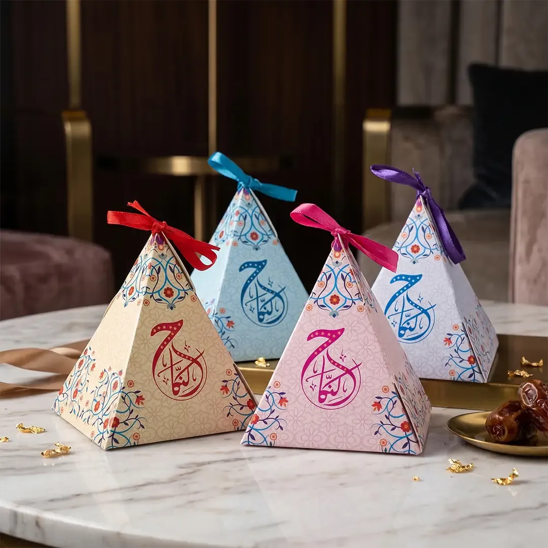 Pyramid Shape Nikah Mubarak Gift Box 3 Premium Custom Pyramid Shape Gifting Boxes by Printel Deziner Delhi featuring traditional mandala patterns and silk ribbon closures in pastel pink, blue, and cream