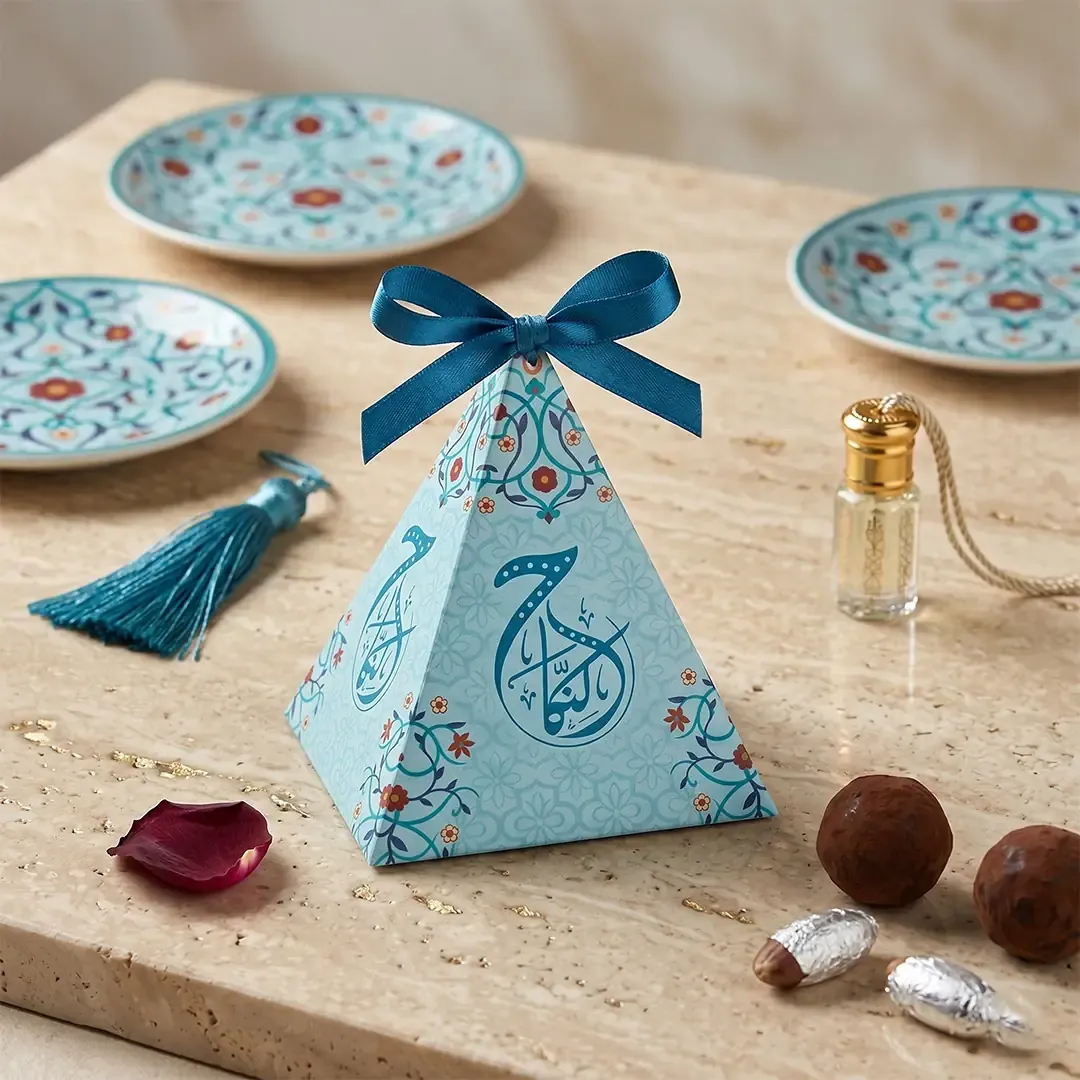 Pyramid Shape Nikah Mubarak Gift Box 1 Premium Custom Pyramid Shape Gifting Boxes by Printel Deziner Delhi featuring traditional mandala patterns and silk ribbon closures in pastel pink, blue, and cream
