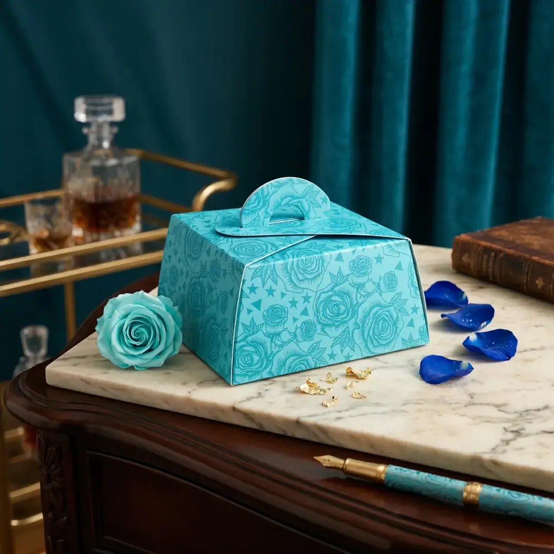 Premium rose-themed handle favor boxes by Gifting Box Manufacturers in Delhi Printel Deziner, available in sky blue, rose pink, yellow, and lavender