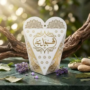 Premium Gold Foil Nikah Box Printing in Delhi by Printel Deziner featuring white heart-shape favor boxes with gold stamped Qubool Hai calligraphy and floral filigree